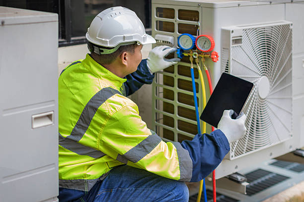 Professional Air Duct Cleaning technician working in Dallas, OR